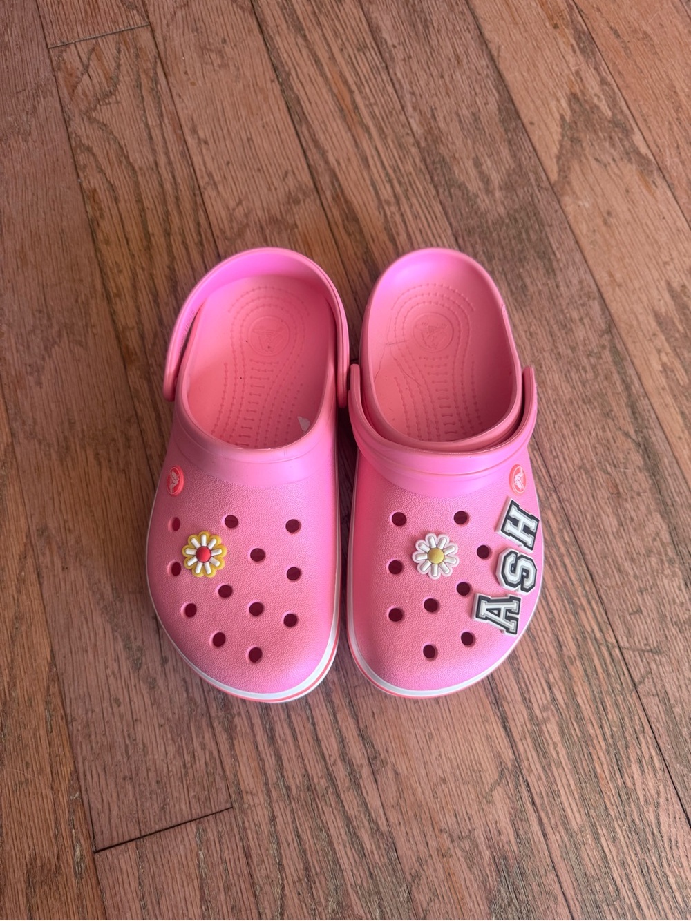 CROCS Kids Pink Clogs with Daisy Jibbitz and Name Letter Charms